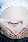 Natürliche Fotografie Babybauch Herz